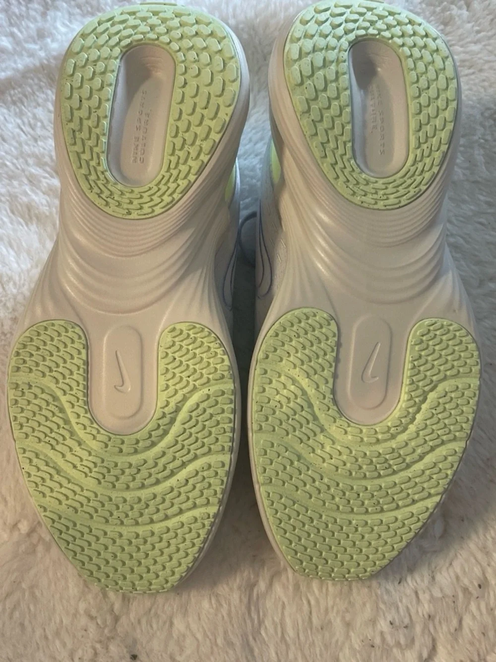 Nike White and Light Gray Sneakers with Subtle Black Swoosh